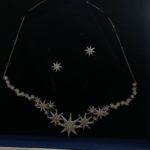 Never worn brand new Swarovski necklace and earrings